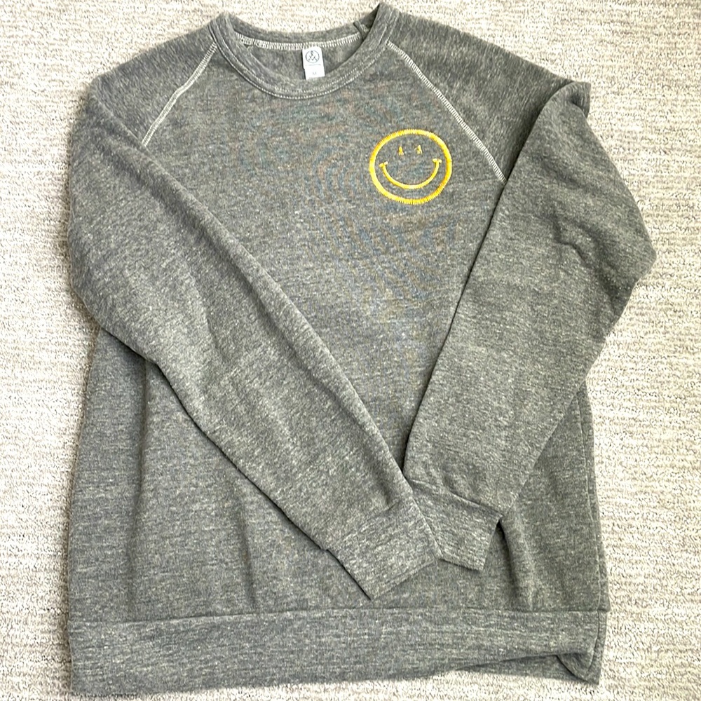 Custom embroidered yellow smiley face grey crewneck sweatshirt. Size M.